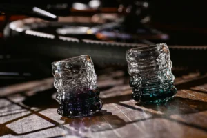 2 blown glass whiskey glasses